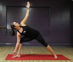 yoga instructor jessica ig does the triangle representing bikram yoga on tuesday aug 25