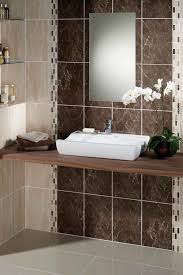 Browse our varied tile ranges, in styles and colours to suit any space. Brown Bathroom Tile Beauty Feel The Home Modern Bathroom Tile Bathroom Tiles Design Ideas Bathroom Wall Tile