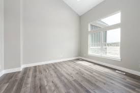 75 laminate floor family room with gray