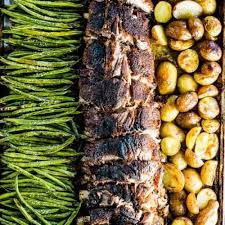 oven baked ribs with potatoes and green