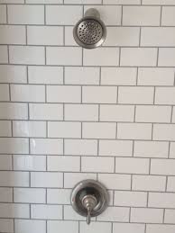 White Subway Tile With Delorean Grey Grout With Moen Shower