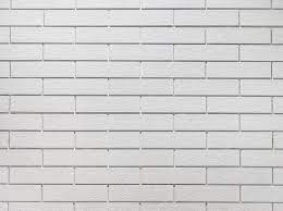 white brick tile wall background stock