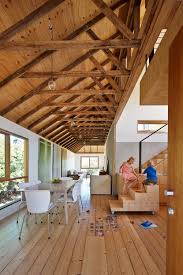 look up exposed wooden beams make an