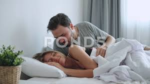 happy couple lover on bed hug and kiss