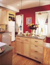 The crisp cherry red feels modern and unique while maintaining. I Like The Storage This Island Has Kitchencolourcombinations Red Kitchen Walls Yellow Kitchen Kitchen Colors