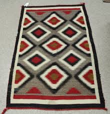 navajo rug with diamond motifs 63 x 36