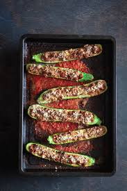 This is like a savoury tray bake, with marrow, herbs and parmesan cheese. Mediterranean Stuffed Marrows With Beef Mince The Classy Baker