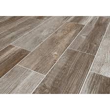 Wood floors are a classic addition to any home. Style Selections Woods French Gray 6 In X 24 In Glazed Porcelain Wood Look Floor Tile In The Tile Department At Lowes Com
