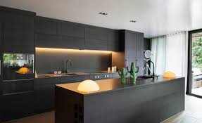 Another great look is to paint the top cabinets a traditional white and the bottom cabinets a sunny yellow. One Color Fits Most Black Kitchen Cabinets