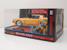 Transforming easily between bumblebee robot and classic chevrolet camaro, this anniversary edition will be equally at home on the shelf as he when playing with bumblebee transformers toys just isn't enough, now you can be bumblebee with this awesome voice changing mask! Modellauto Chevrolet Camaro 1977 Gelb Bumblebee Transformers Modellauto 1 24 Jada Toys 29 95