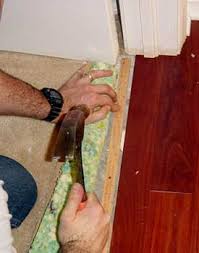 installing carpet against hardwood