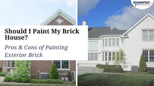 Request free quote side yard landscape design in glenview, illinois features the use of gray in your landscape with blue stone and crushed blue stone path, water feature, garden plants, and painted brick wall. Should I Paint My Brick House Pros Cons Of Painting Exterior Brick Professional House Painters