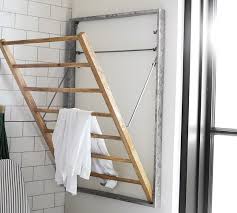 Pull your rack down, hang your clothes, rise it up send it up back again and youll save your space wood dowels are covered with water resistant special varnish. Galvanized Wall Mount Laundry Drying Rack Pottery Barn