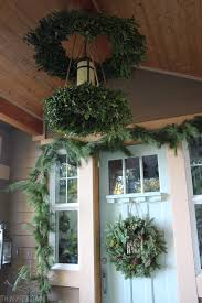 festive boxwood wreath chandelier