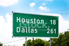 Texas Highway Sign Showing Houston And Mileage Stock Photos