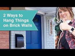 Two Ways To Hang Things On A Brick Wall
