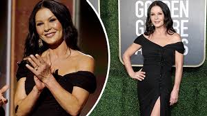 Her first stage appearance was at age nine as one of the orphan girls in a west end production of the musical annie. Golden Globes Catherine Zeta Jones 51 Stuns In Black Gown