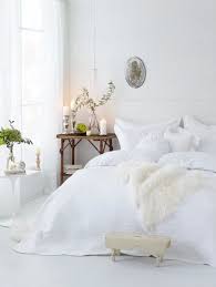 fluffy bedding all white bedroom