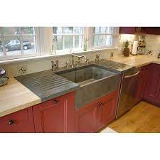 Is it the sink's timeless look or it's ability to hold up to washing babies, dogs and giant spaghetti pots? Betonas Apron Front Farm Sink Drainboard But It S Concrete Farmhouse Sink Kitchen Kitchen Sink Drainboard Kitchen Design