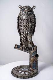 Metal owl artist