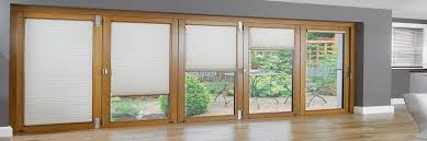 are patio doors with blinds inside a