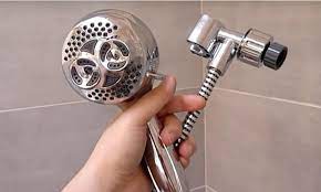 remove flow restrictor from shower head