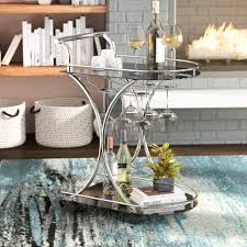 The first part of creating a bar space at home is mobile cart, and the bathilde bar cart couldn't be more perfect. Bar Carts Wayfair
