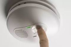 Why is a hard-wired smoke alarm chirping?