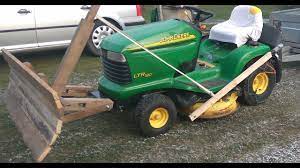 homemade lawn tractor snow plow in