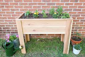 to build a raised garden bed with legs