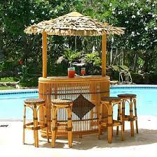 Tiki Bar With Thatched Roof And Stool