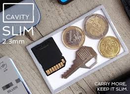 Extra Key And Coins In A Minimal Wallet