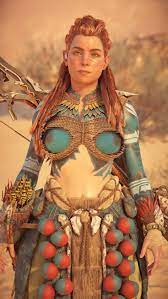 aloy (horizon), horizon forbidden west, horizon zero dawn, game cg,  highres, 1girl, 3d, bodypaint, braid, breasts, female focus, freckles, game  console, glitch, long hair, messy hair, navel, nipples, outdoors, red hair,  solo,