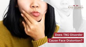 does tmj disorder cause face distortion