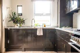 painted brown kitchen cabinets are