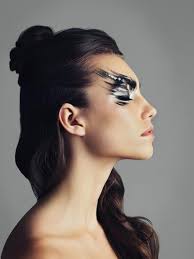 young woman wearing bold eye makeup