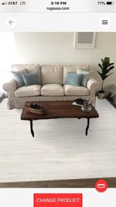 dark floor and beige sofa