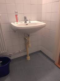 bathroom sink cabinet with floor plumbing