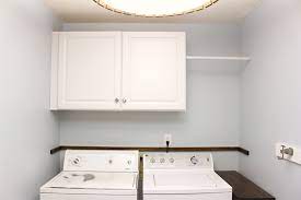 installing wall cabinets in laundry