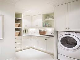 Tamara cannon of provident home design pretty much remade her laundry room, with fresh paint, new flooring, a new vanity and cabinets and even a new space for her cat's litter box. Laundry Room Cupboards Hidden Bookshelf Door Secret Home Depot Utility Room Cabinets Wearegroves