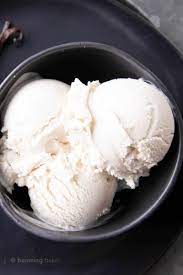 Fill cylinder of ice cream maker; Vegan Vanilla Ice Cream Recipe Beaming Baker