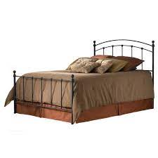 queen metal bed with rounded posts in
