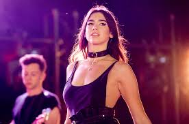 Dua lipa strips down to sparkly pink lingerie after making two outfit changes during her racy performance. Watch Dua Lipa Take Over Npr S Tiny Desk Home Dancing Astronaut Dancing Astronaut