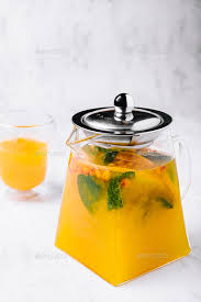 Orange Aromatic Hot Drink In Glass Jar