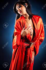 Sexy Japanese Woman On Red Kimono. Stock Photo, Picture and Royalty Free  Image. Image 6809038.