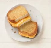 How many calories are in a half grilled cheese from Panera?