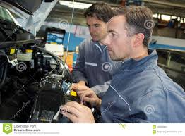 Car Mechanic And Assistant In Garage Stock Image Image Of