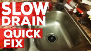 fix a slow draining kitchen sink diy