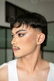 asian man with heavy makeup