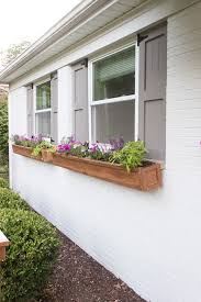 Add a plastic planter insert so you can easily swap out. How To Make A Simple Window Flower Box